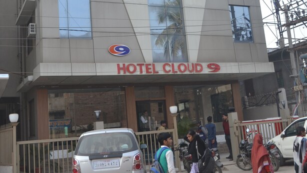 A modern hotel building with a prominent sign reading "HOTEL CLOUD 9". - Hotel cloud 9 (Madhubani)