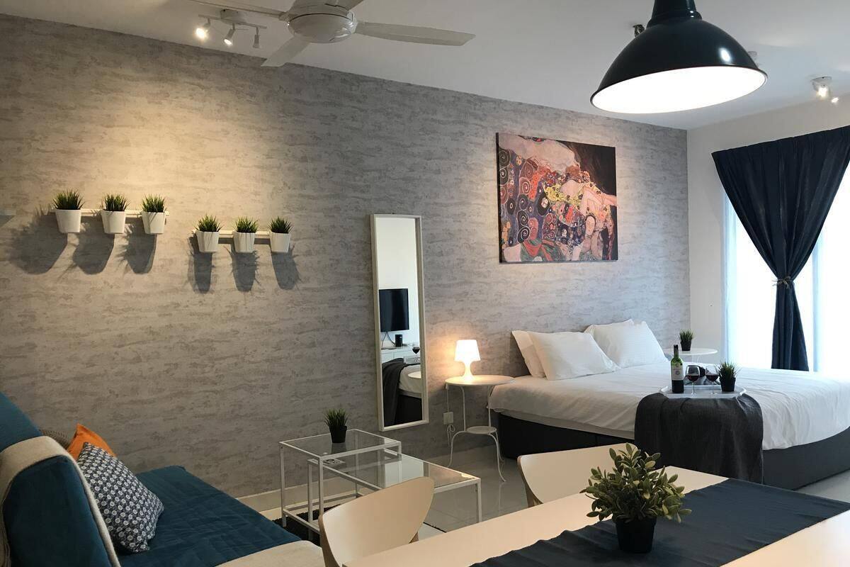 Premium bedding, blackout curtains, iron/ironing board, free WiFi