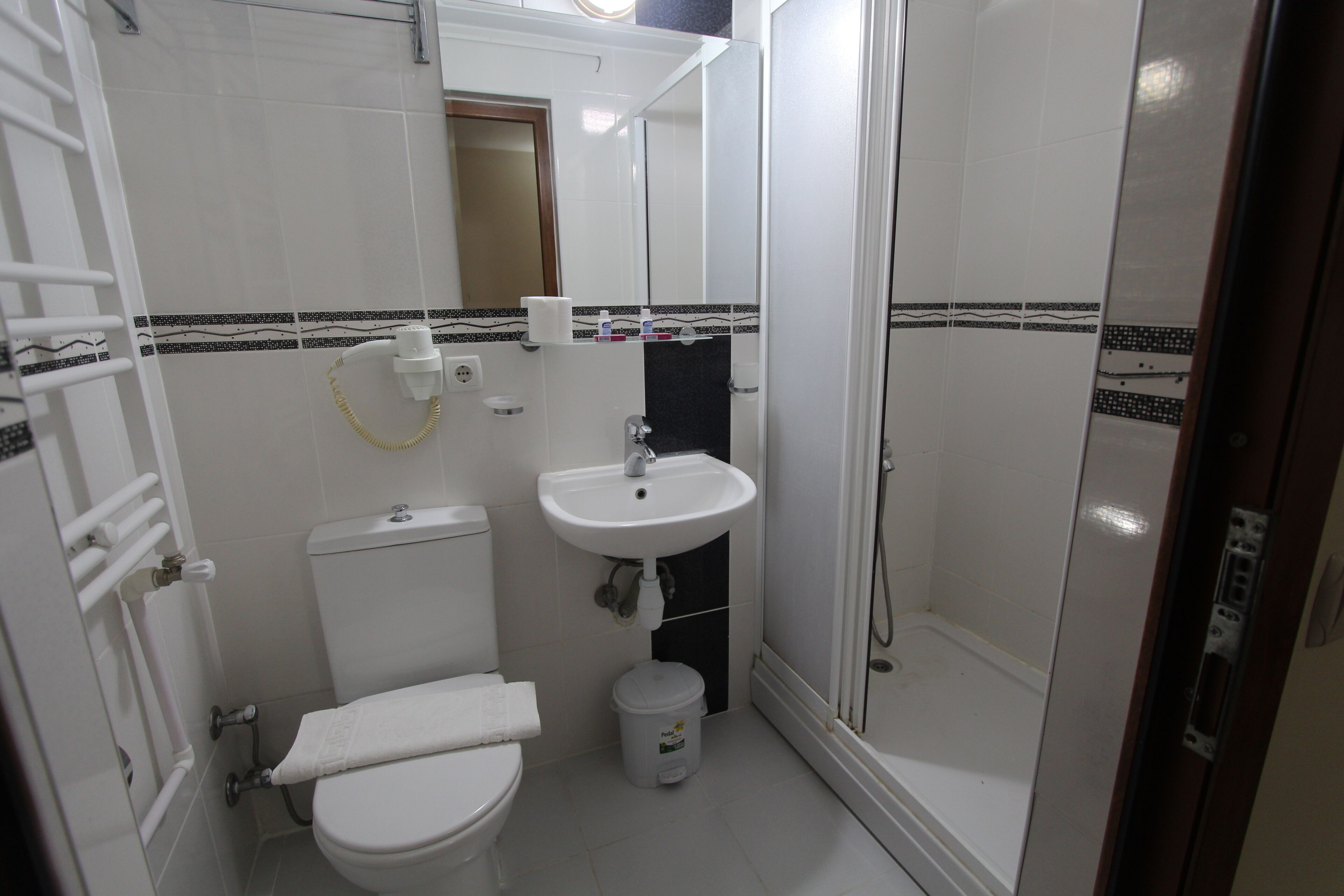 shower, free toiletries, hair dryer, slippers