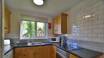 Fridge, microwave, oven, dining tables