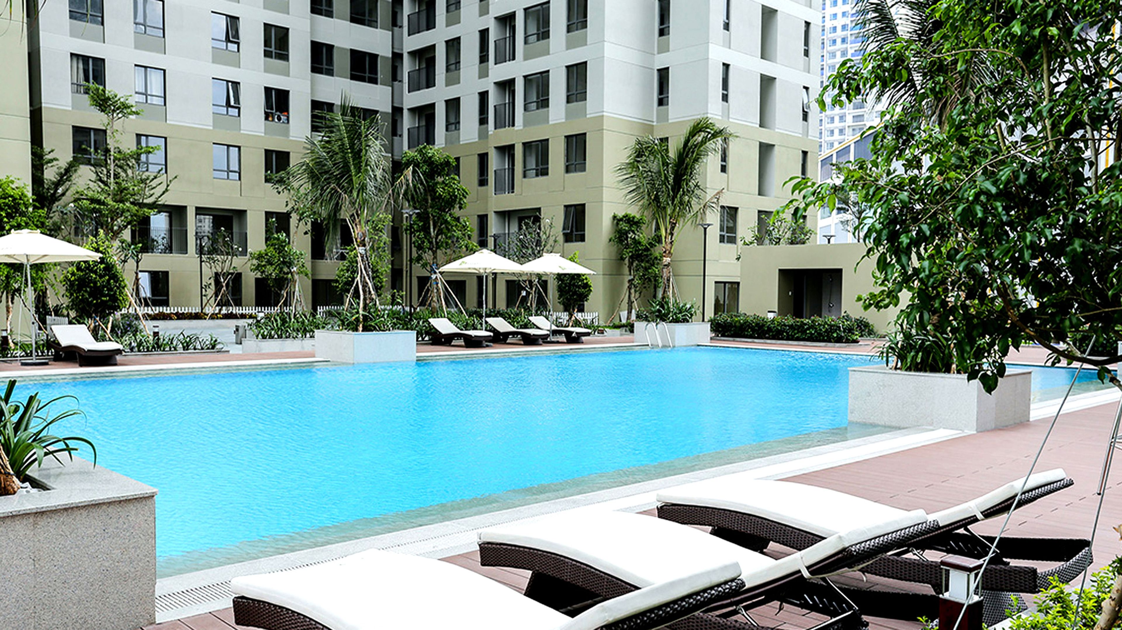 outdoor pool, pool umbrellas, pool loungers