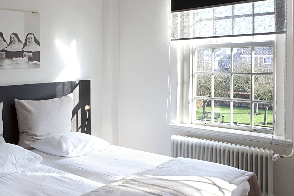 Double or Twin Room | Desk, iron/ironing board, free cribs/infant beds, rollaway beds