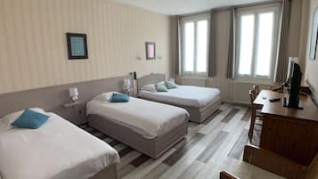 Family Room | Premium bedding, individually decorated, individually furnished, desk