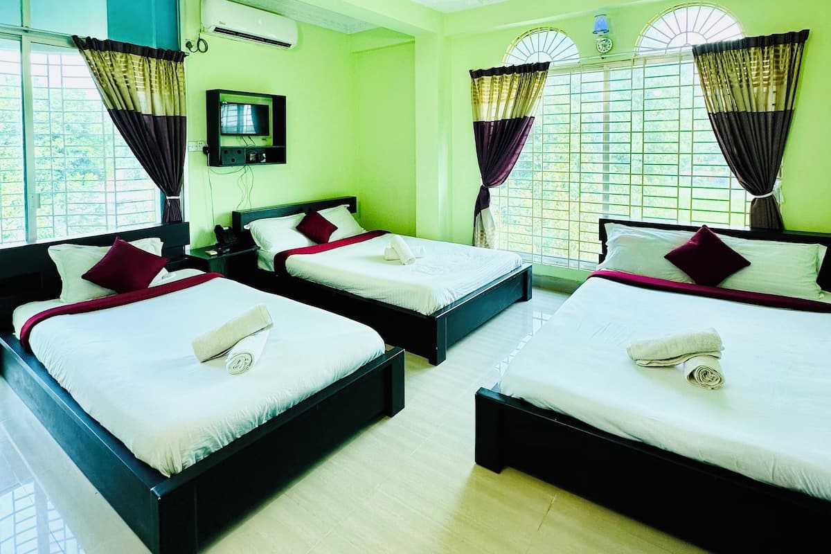 Family Quadruple Room | 1 bedroom, down comforters, in-room safe, individually decorated