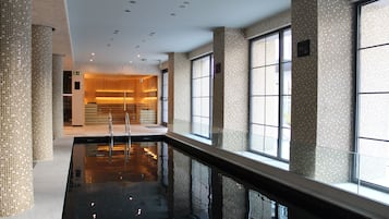 Indoor pool, 2 outdoor pools, open 8:00 AM to 8:00 PM, pool umbrellas