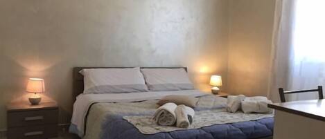 Basic Double Room | Minibar, in-room safe, desk, iron/ironing board (on request)