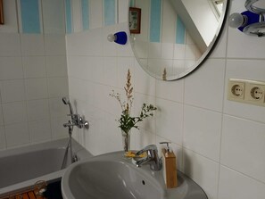 Hair dryer, towels, soap, toilet paper