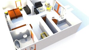 En 3D-model af et hotelværelses layout med seng, siddeområde, badeværelse og en lille balkon.
