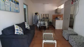 Classic Double Room | Living area | Flat-screen TV