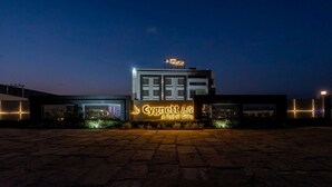 A hotel named 'Cynnett Lite' with a sign indicating it is a unit of 'Gilly's'. - Cygnett Lite (Alwar)