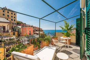 Su íte superluxo, 1 cama King, vista para o mar, em edifício anexo | Vista do quarto