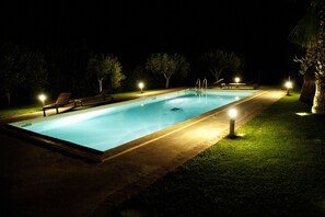 Outdoor pool, a lap pool, pool loungers