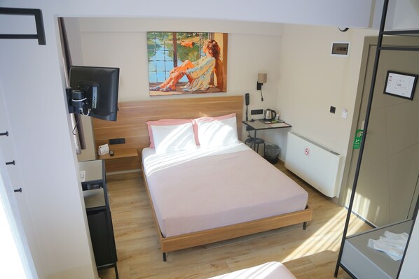 Standard Triple Room, Mountain View | Minibar, in-room safe, desk, blackout curtains