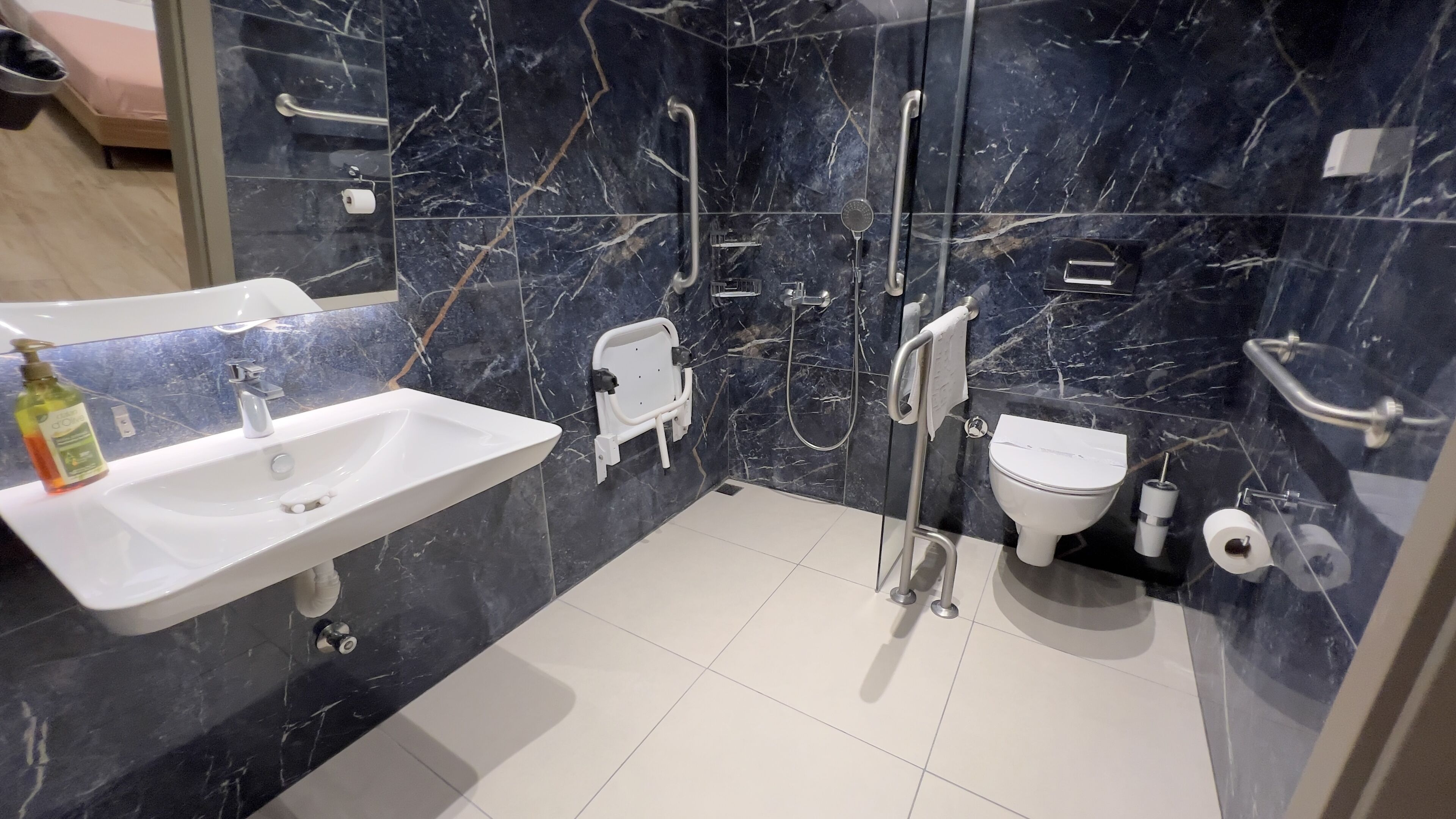 family triple room, accessible, ground floor | bathroom | shower, hair dryer, slippers, bidet