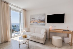 Junior Suite, Balcony | Minibar, in-room safe, desk, blackout drapes