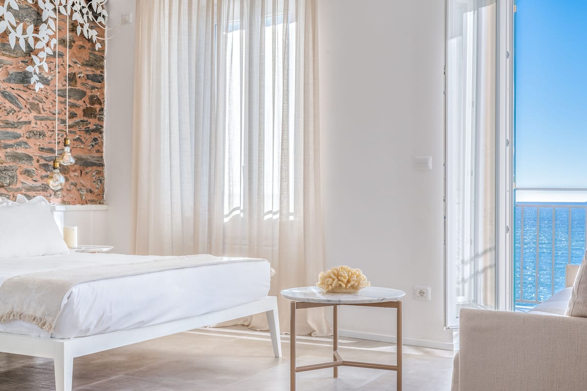 Junior Suite, Balcony | Minibar, in-room safe, desk, blackout drapes
