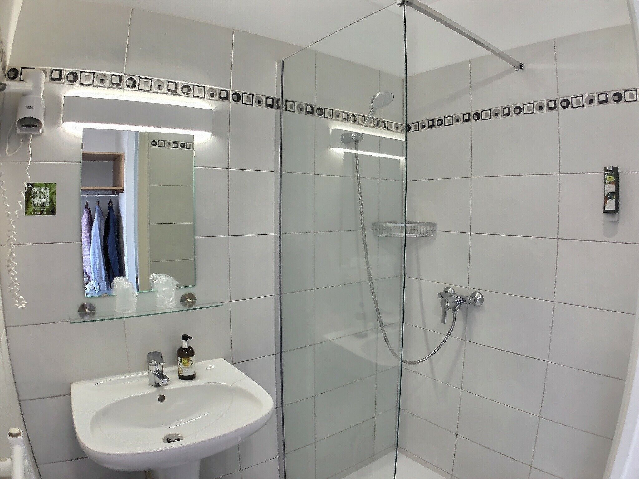 shower, free toiletries, hair dryer, towels