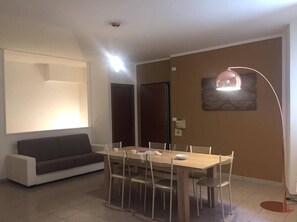 Apartment, 2 Bedrooms | Living room | Flat-screen TV