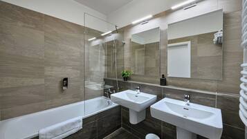 Family Apartment, 3 Bedrooms, Balcony, City View | Bathroom | Deep soaking tub, free toiletries, hair dryer, towels