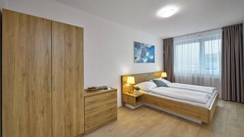 Family Apartment, 3 Bedrooms, Balcony, City View | 1 bedroom, desk, laptop workspace, soundproofing