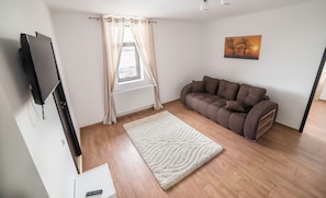 City Apartment, 1 Bedroom, Non Smoking, City View | Living area