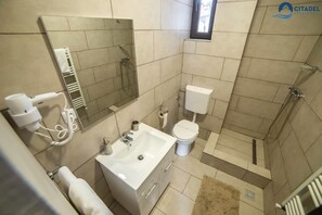 Shower, free toiletries, hair dryer, slippers