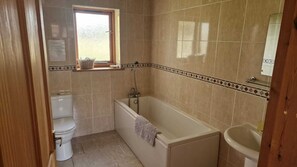 The Dairy Cottage, (Upto Five People) | Bathroom | Combined shower/bathtub, hair dryer, towels, soap - Setcops Farm Holiday Cottages (Market Rasen)