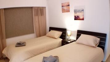 Apartamento exclusivo, 3 habitaciones | 1 dormitorio, tabla de planchar con plancha, wifi gratis y ropa de cama