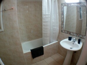 Exclusive Apartment, 3 Bedrooms | Bathroom | Shower, free toiletries, hair dryer, towels
