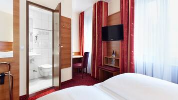 Double or Twin Room | Minibar, in-room safe, desk, blackout curtains