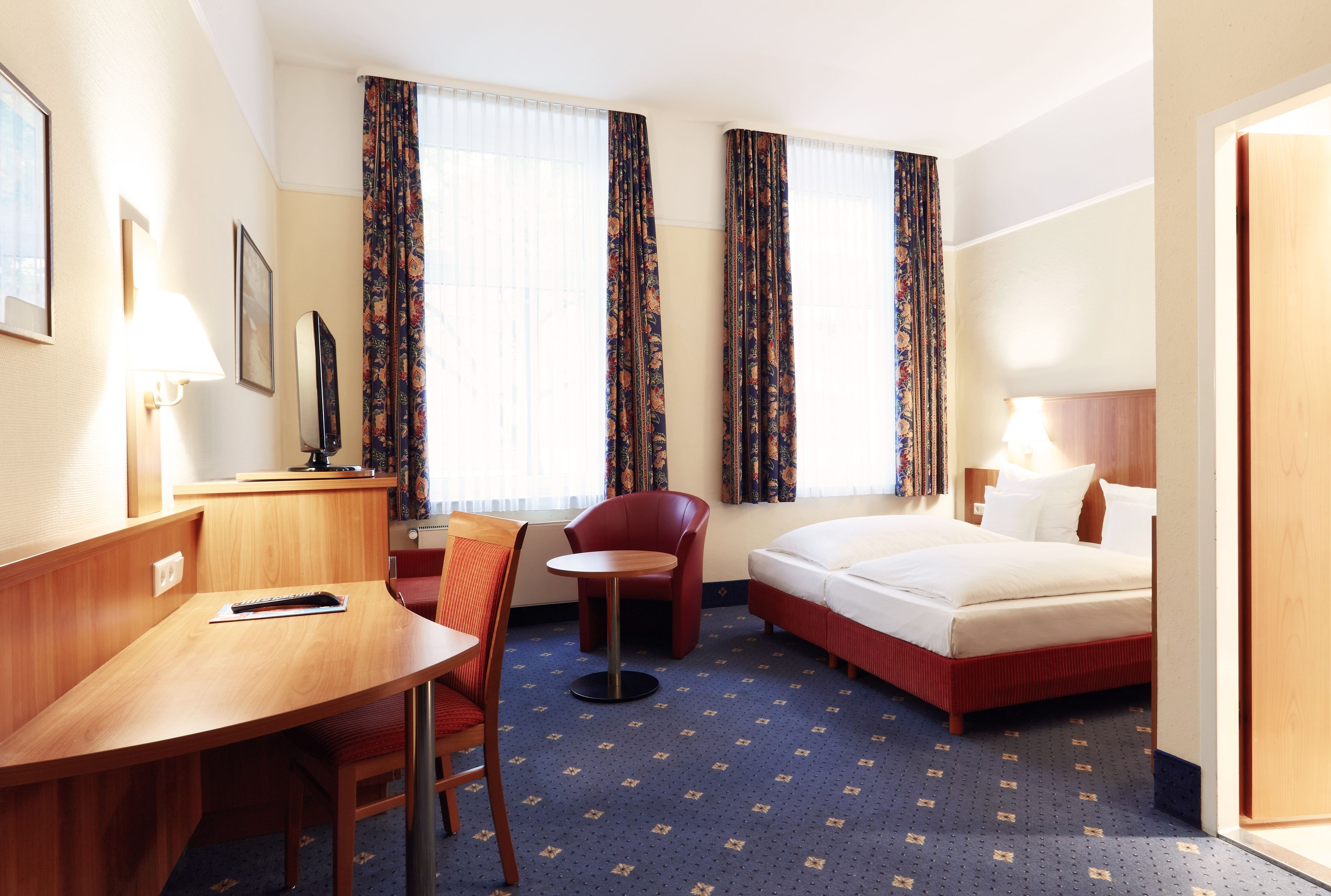 double or twin room | minibar, in-room safe, desk, blackout curtains