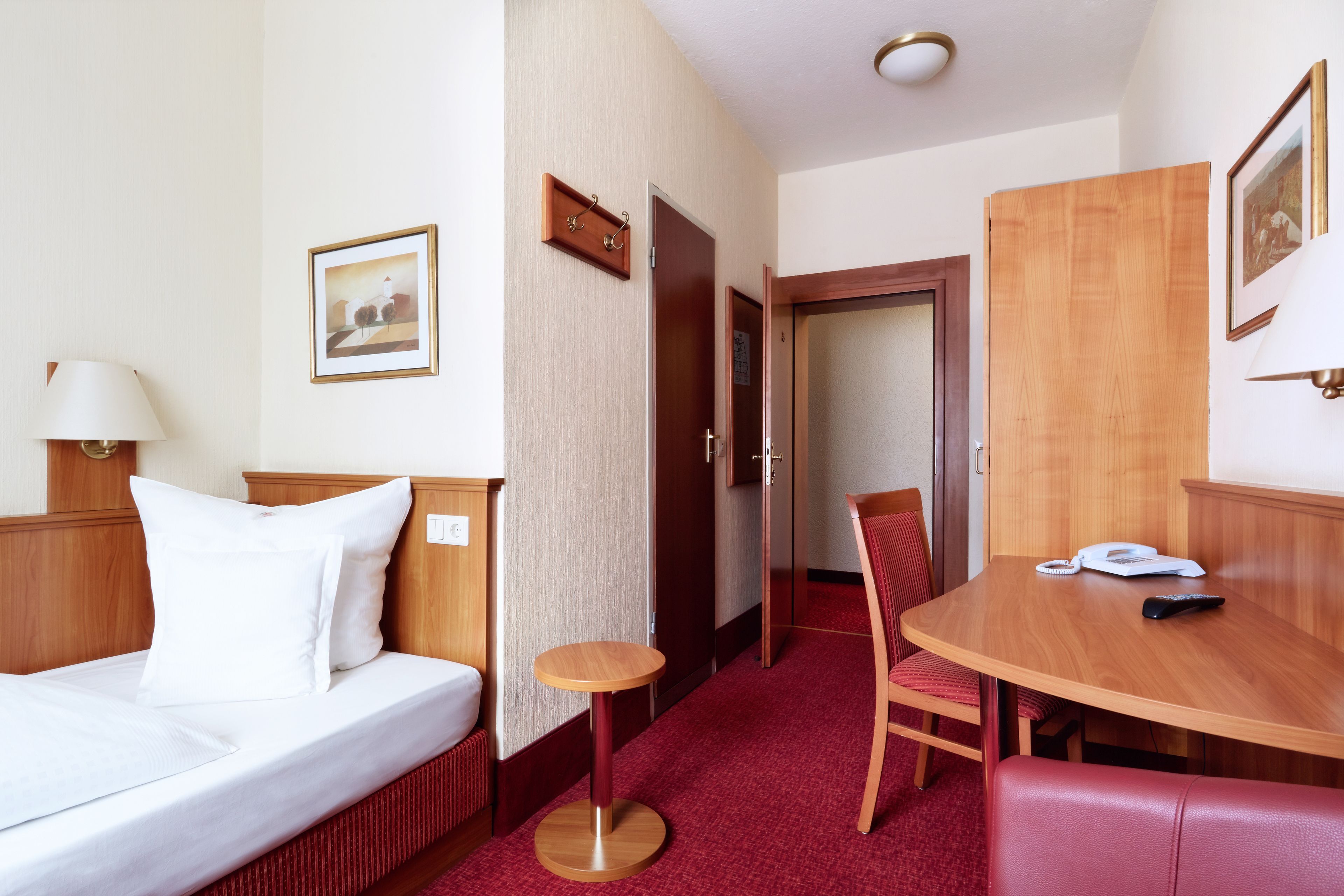 single room | minibar, in-room safe, desk, blackout curtains