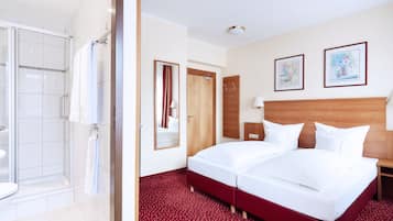 Double or Twin Room | Minibar, in-room safe, desk, blackout drapes