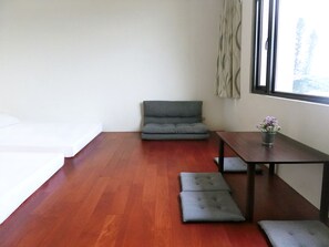 Family Quadruple Room, 1 Bedroom, Shared Bathroom, Sea View | 1 bedroom, soundproofing, free WiFi - Migratory Birds Hotel (Toucheng)