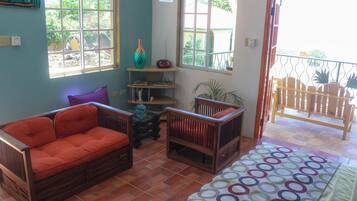 Comfort Studio Suite, 1 Queen Bed, Ocean View, Beachfront | Living area | Flat-screen TV