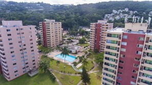 Outdoor pool, pool loungers - Beach Condo at Turtle Towers (Ocho Rios)