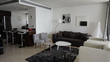 Apartment, 2 Bedrooms | Living area | TV