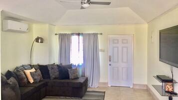 Family House, 2 Bedrooms, Accessible, 2 Bathrooms | Living area | Flat-screen TV