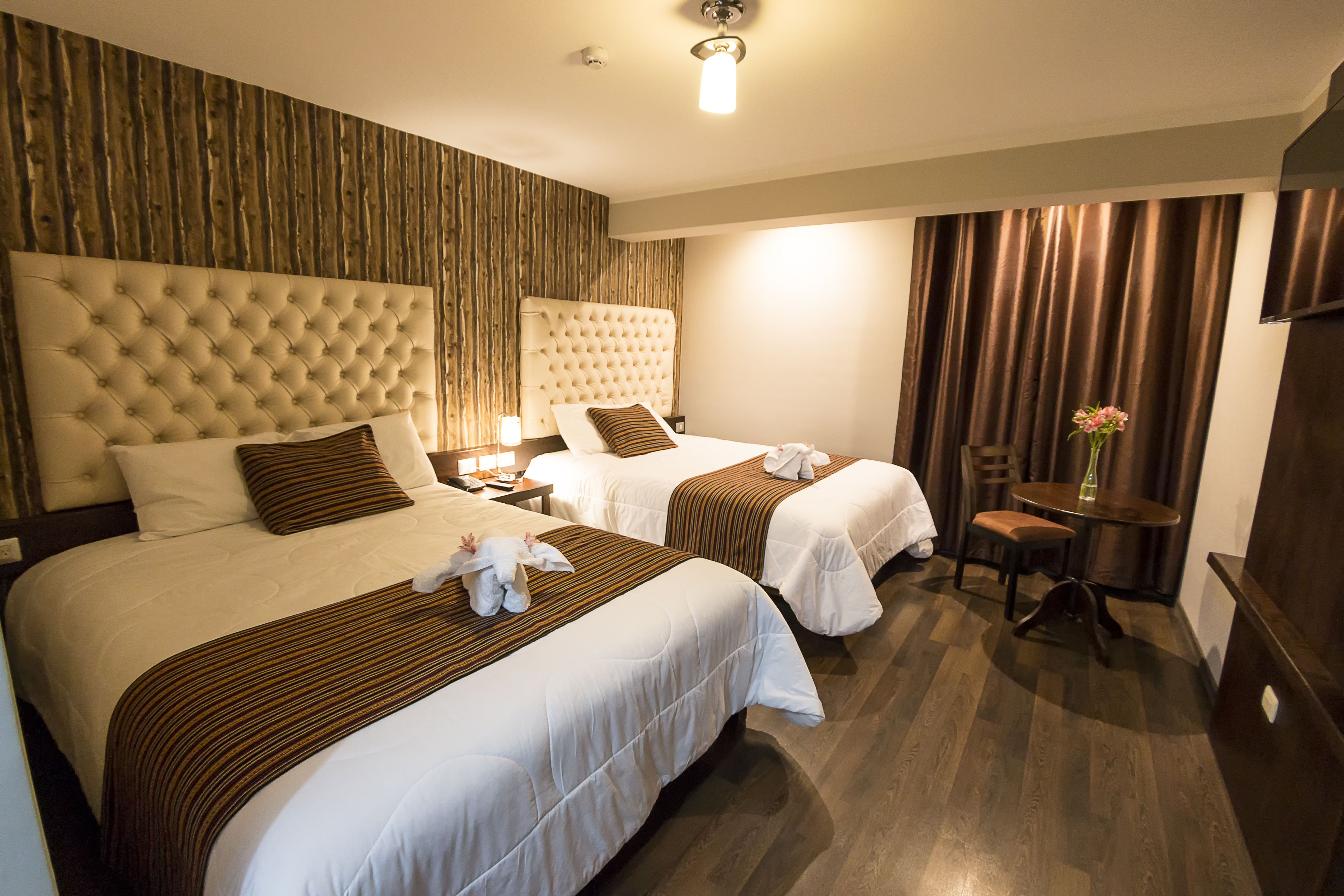 family room, 2 queen beds | in-room safe, desk, free wifi