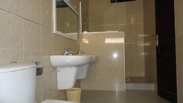 Apartment, 4 Bedrooms | Bathroom | Shower, free toiletries, hair dryer, towels