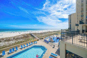 A hotel pool with a view of the beach and ocean. - PREMIUM 2 Bedroom @ P5 ~ Great Rates (Orange Beach)