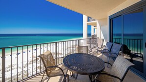 A balcony with a view of the beach and ocean. - Splash Pad and New Amenities! Phoenix East 2BR 2BA (Orange Beach)