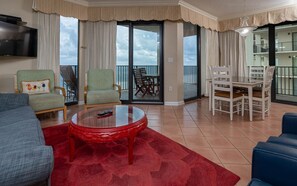 Flat-screen TV, books - Phoenix East II 2111 - 3BR Condo on the Beach! (Orange Beach)