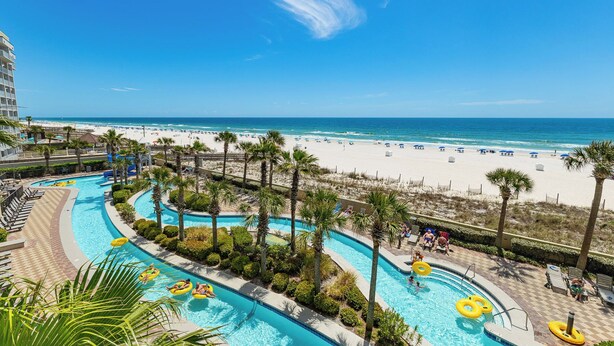 A resort with a pool area, beach, and ocean view. - Phoenix West 305 Your Coastal Getaway! (Orange Beach)