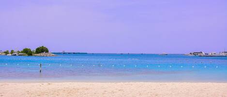 On the beach, white sand