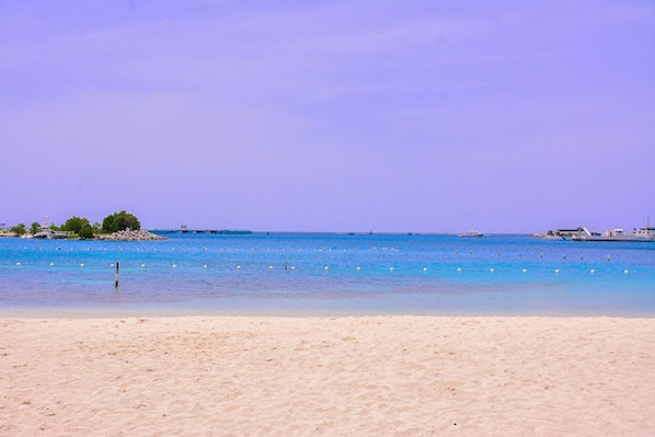 On the beach, white sand