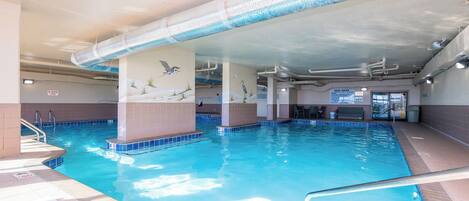 Relax in the indoor pool surrounded by soothing decor, perfect for unwinding after a day at the beach on Alabama's Gulf Coast