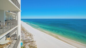 A beachfront hotel with balconies overlooking the ocean. - The Oasis at Orange Beach, formerly known as Phoenix West II, Unit 2405 (Orange Beach)