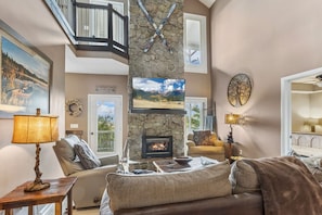 Living Room with Stacked Stone Gas Log Fireplace