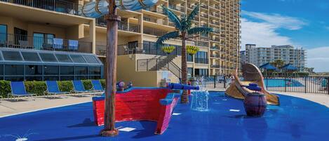 Splash into fun at this mini water park with playful water features and a colorful pirate ship, perfect for family adventures